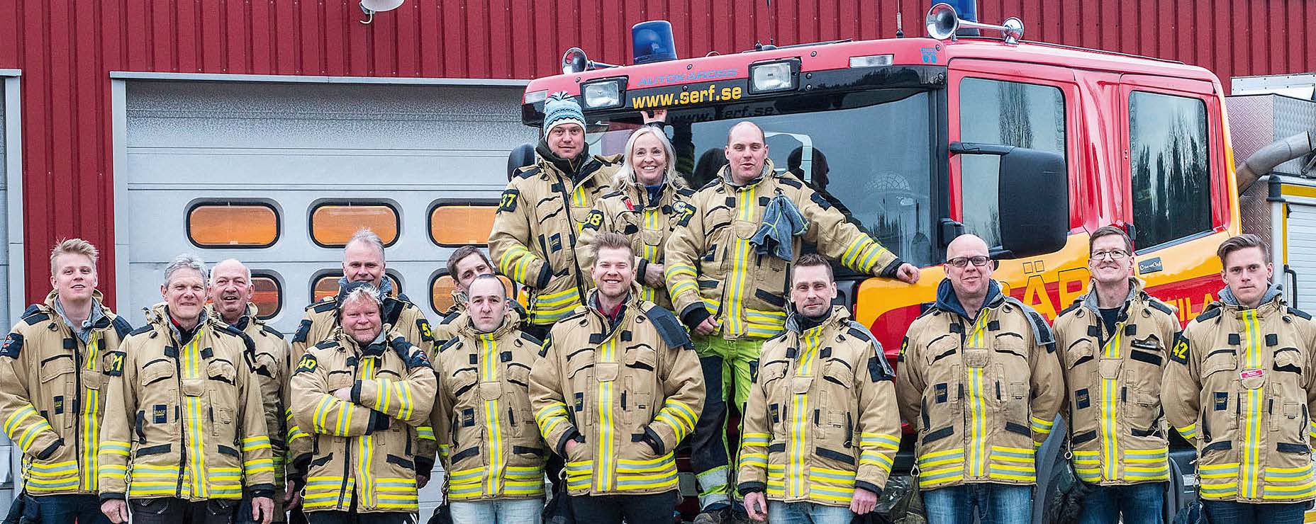 Gruppbild på anställda brandman i beredskap i Sätila